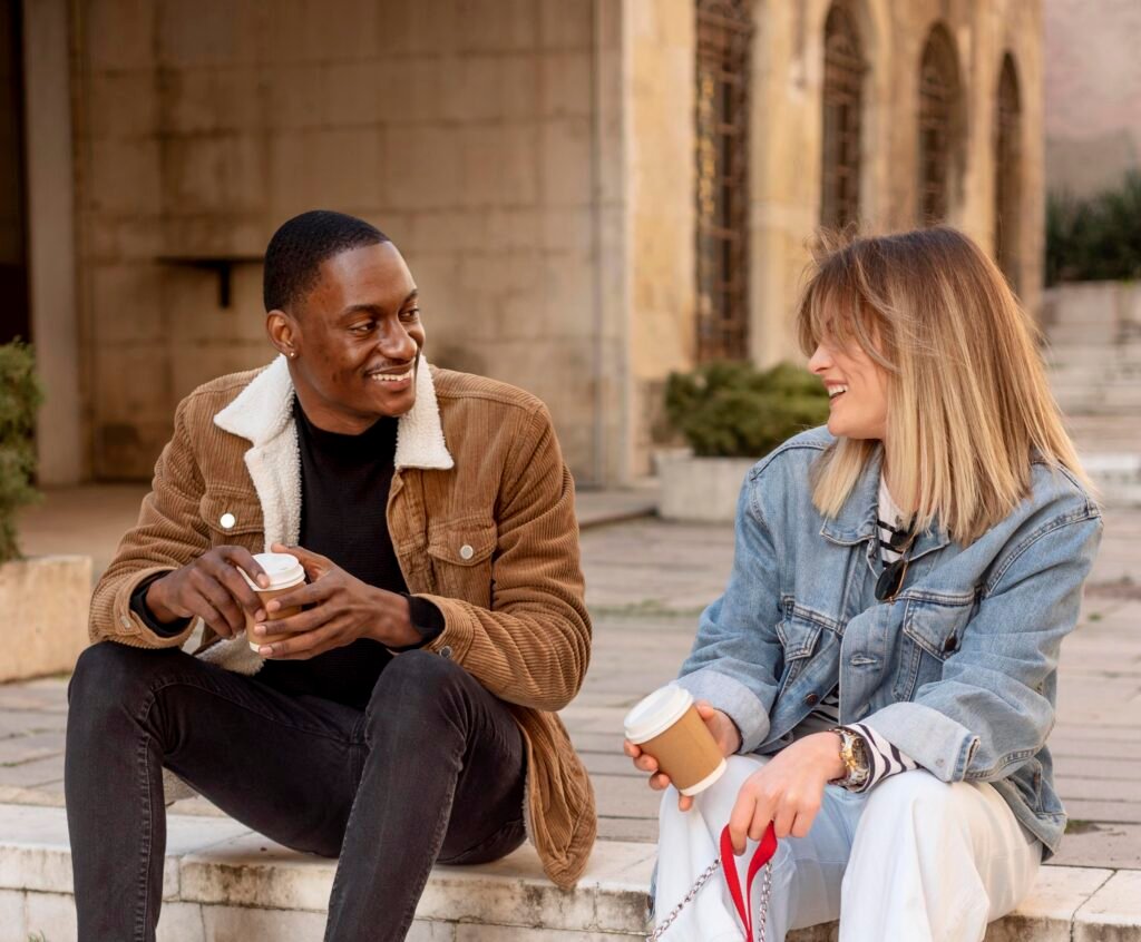 best friends hanging out while enjoying cup coffee