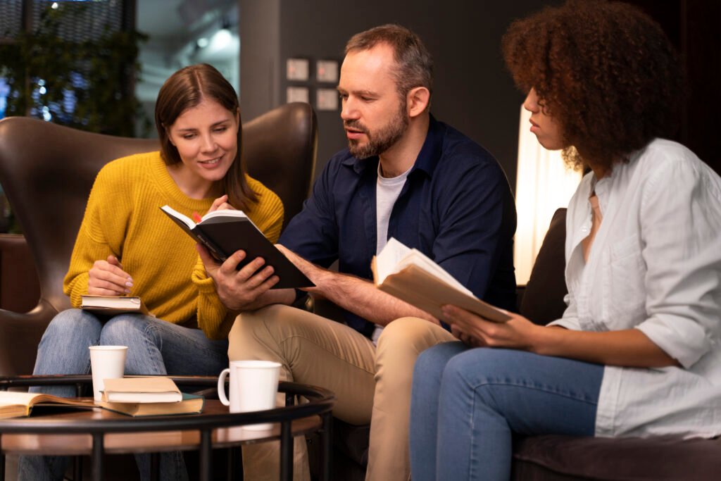 side view people reading together